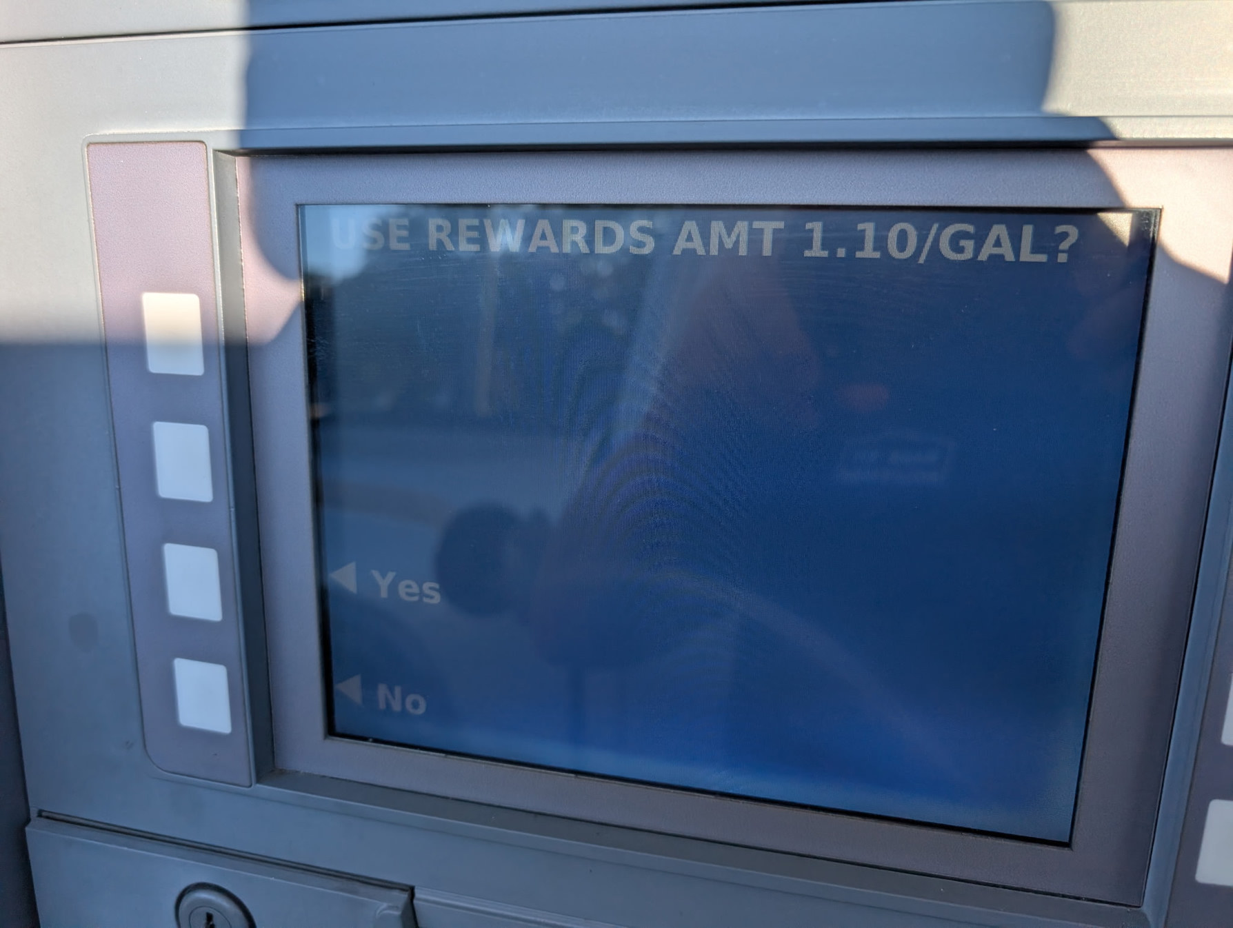 Pump screen asking to use a rewards amount of $1.10 per gallon, with Yes and No.